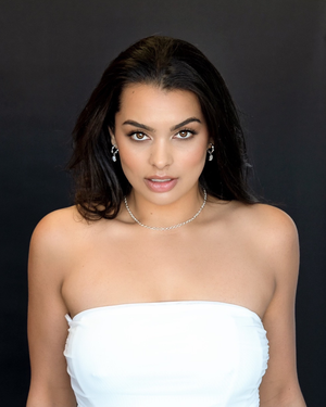 Model wearing Arc Hoops solid .925 sterling silver with natural moonstones.