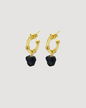 Modern gold hoop earrings featuring natural black onyx gemstones suspended from textured hoops, designed for everyday wear by CVLCHA.