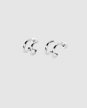A pair of Double Hoop Huggie Earrings in 14k gold plated sterling silver featuring a modern layered hoop design with a polished finish.