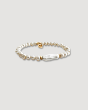 Eva Freshwater Pearl Bracelet by CVLCHA featuring genuine freshwater pearls and a 14K gold plated slip-on design for everyday wear.