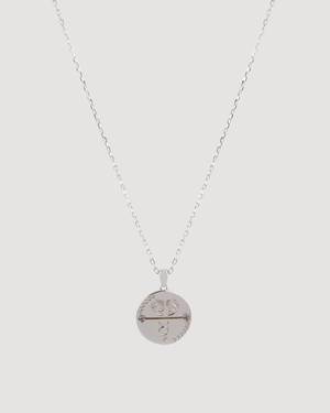 Gemini Zodiac Silver necklace by Cvlcha with a round pendant on a light grey background