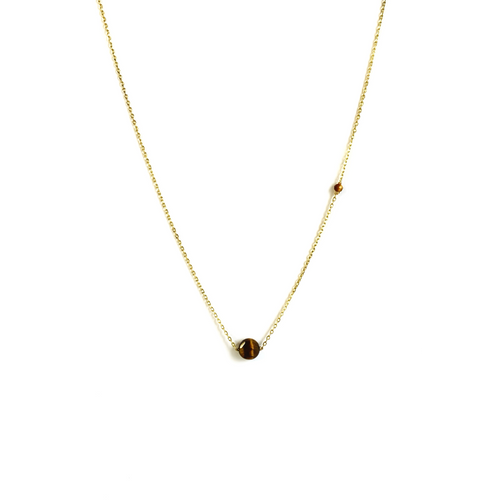 A gold-plated chain necklace with a Tiger Eye gemstone faceted pendant and an additional smaller stone on the side.