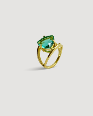 Cvlcha Lilly Gold ring with a trillion cut 5A green colour  zirconia on a light grey background product shot