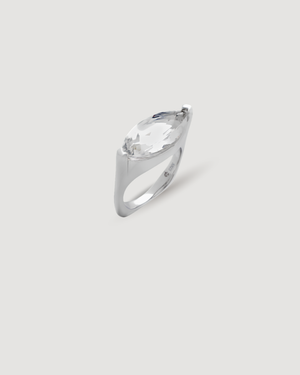 Product shot of The LUMINA Ring featuring a striking marquise-cut stone 5A Clear colour cubic zirconia set in a light grey background 