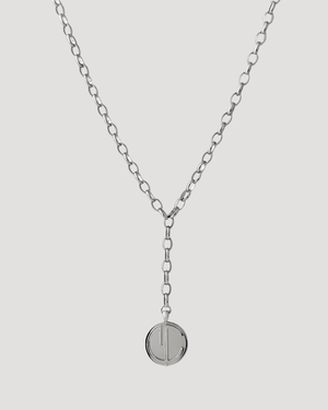 Cvlcha Y-Drop Silver Signature necklace with a round pendant on a light gray background