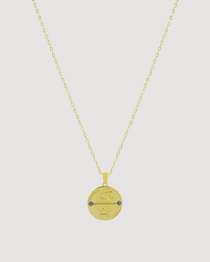 CVLCHA Sagittarius Gold Pendant necklace on a light gray background