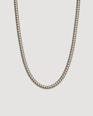 Silver Pearl necklace on a light grey background