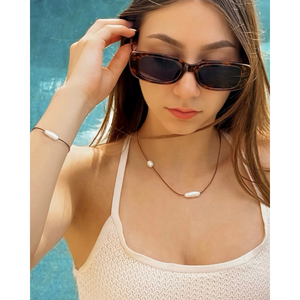 leather cord necklace with two freshwater pearls. CVLCHA