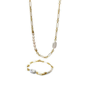 A gold freshwater pearl necklace with a link chain.
