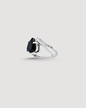 Cvlcha Silver ring with a striking black trillion cut 5a cubic zirconia on a light gray background product shot