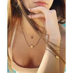 leather cord necklace with gold sone in the middle. layering necklaces CVLCHA