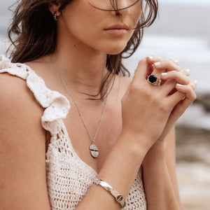woman wearing Luna Aelia Silver necklace 